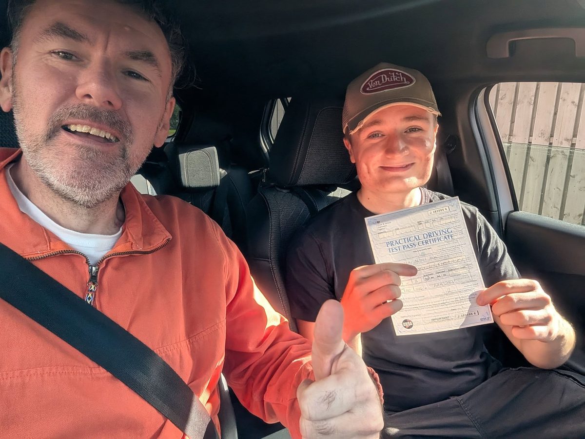Dave with a learner who has just passed their driving test
